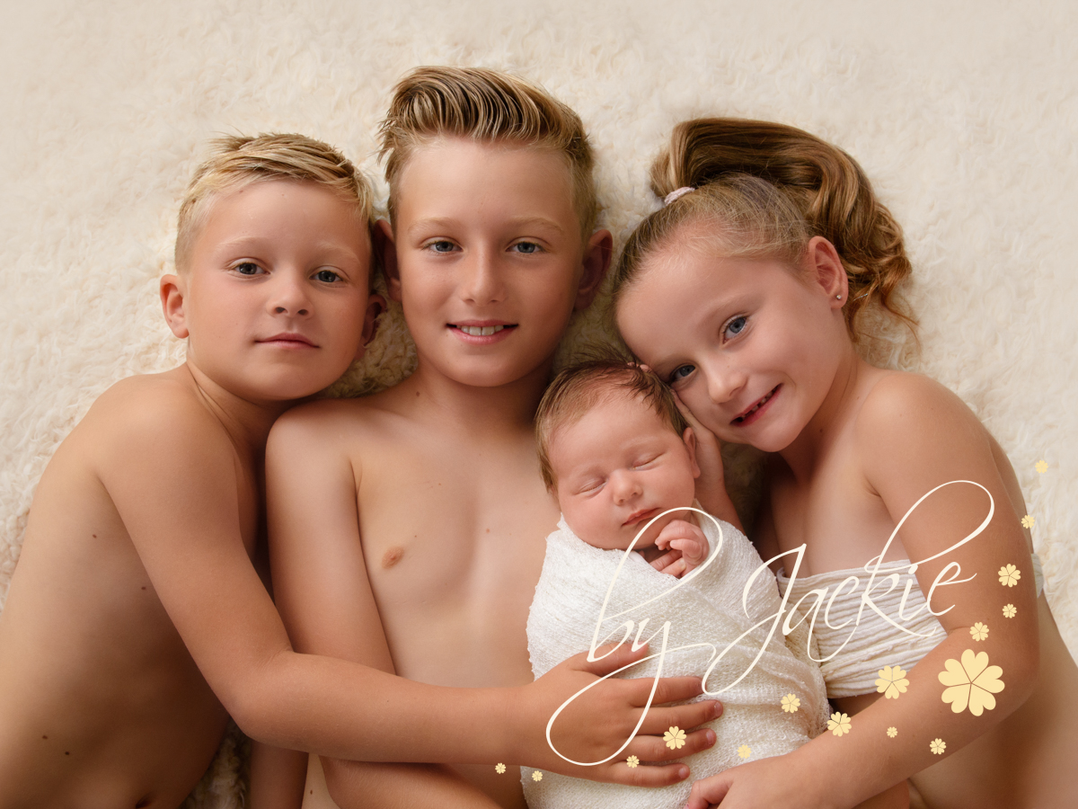 Siblings and baby portrait. Copyright Babies by Jackie