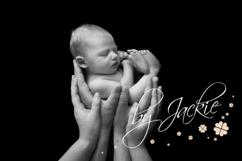 So tiny in our hands, newborn baby held in parents hands, babies by jackie photography, york, leeds, harrogate, brough, hull, yorkshire
