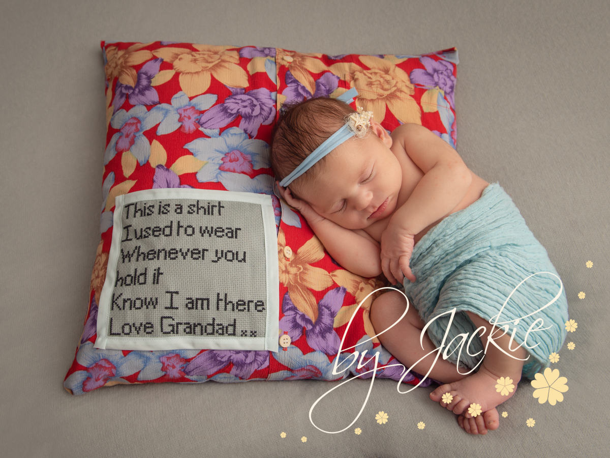 Newborn baby girl portrait with family heirloom. Copyright Babies by Jackie