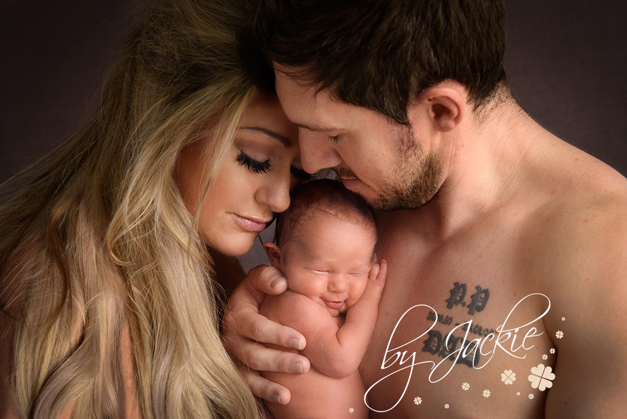 Award winning image of parents with brand new baby boy photographed by Babies By Jackie in York, Leeds, Harrogate and Hull