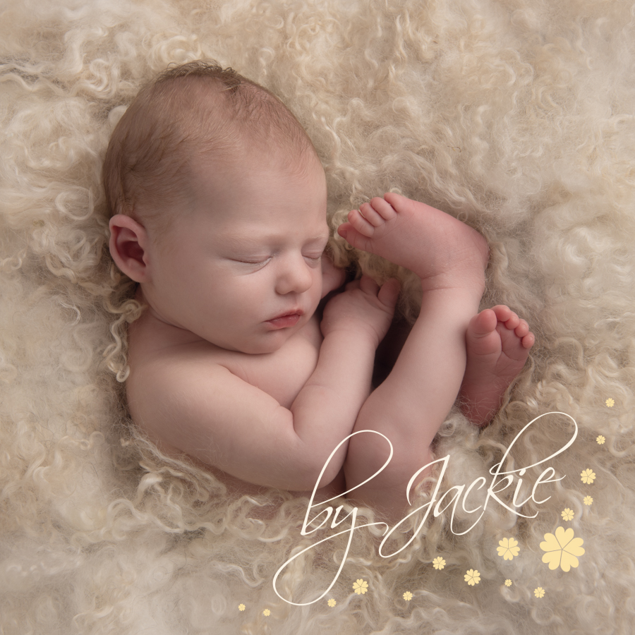 Baby snuggled in fleece wool
