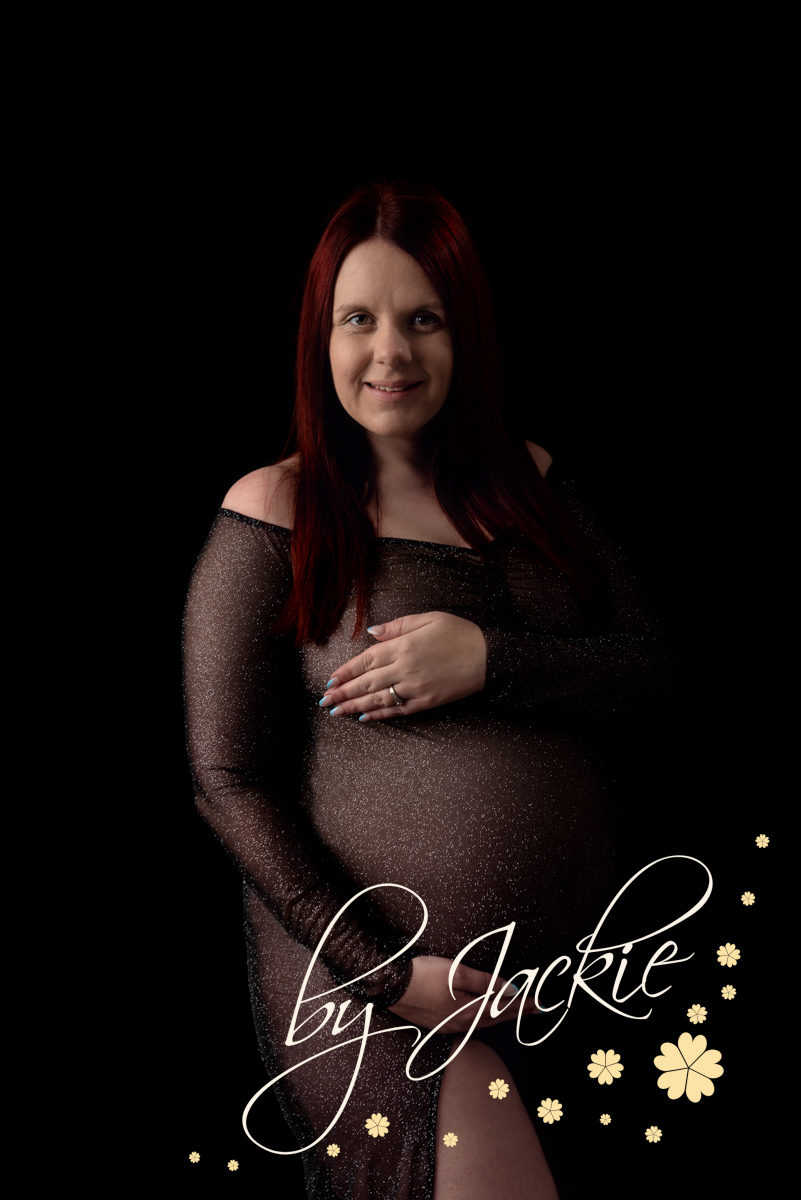 Stunning image of pregnant mum with flowers in her hair Image by Babies By Jackie Photography, specialist maternity photographer in York, Leeds, Harrogate