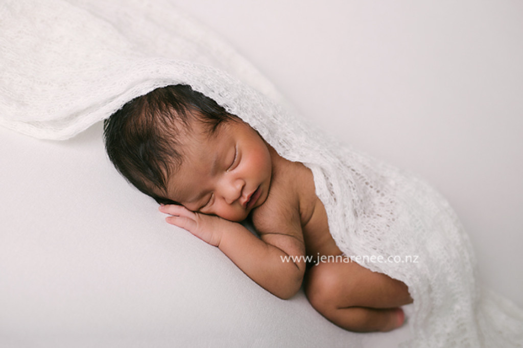 Black and white portrait of newborn baby