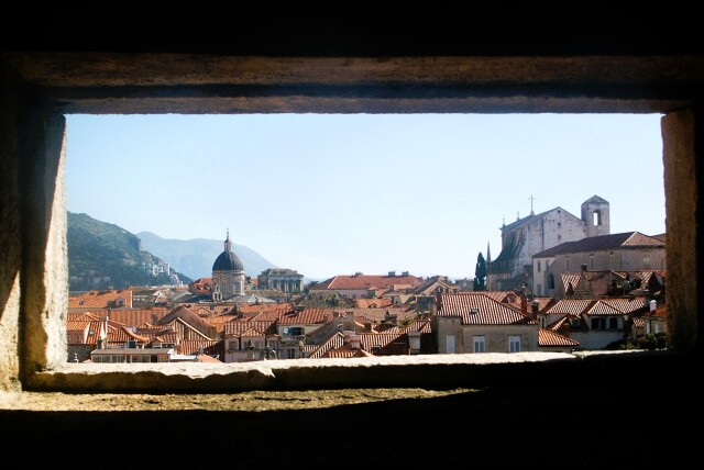 Old Town of Dubrovnik, Croatia, as seen through a window or a stone opening.